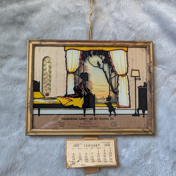 Vintage 1948 advertising calendar and thermometer
